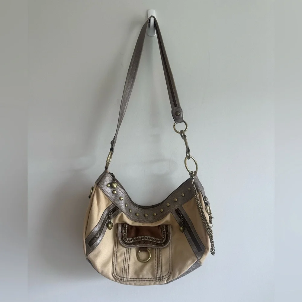 Kathy Van Zeeland brown and tan studded canvas + leather shoulder bag